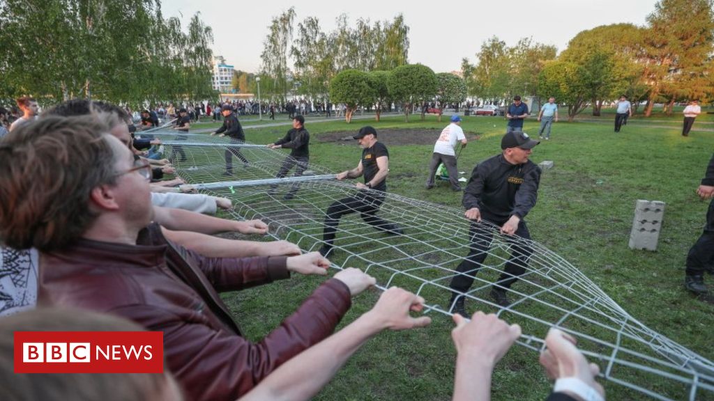 Russian activists storm site of new church