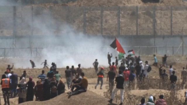 Thousands of Palestinians protest at the Israel border to mark Nakba