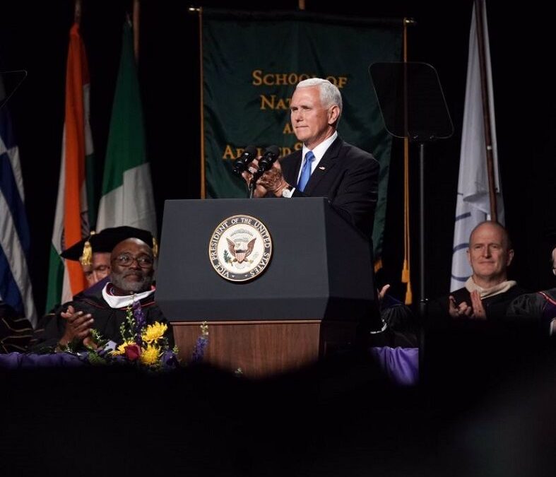 Dozens of graduates walk out before Mike Pence commencement address at Indiana university