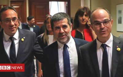 Jailed Catalan MPs attend Spain parliament opening