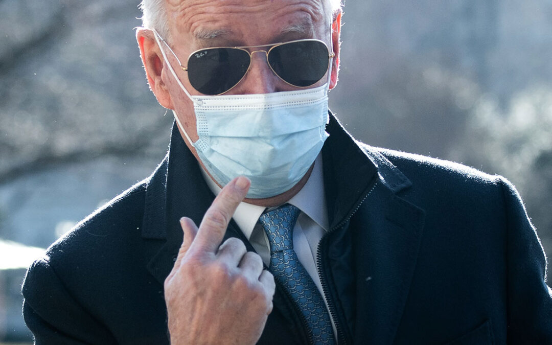 Biden says those vaccinated largely ditch masks