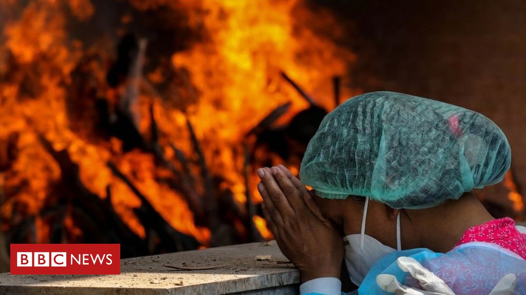 India records 300,000 Covid deaths as pandemic rages