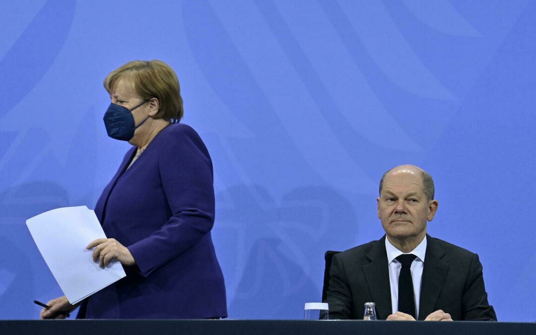 Merkel taps punkrocker for farewell parade...