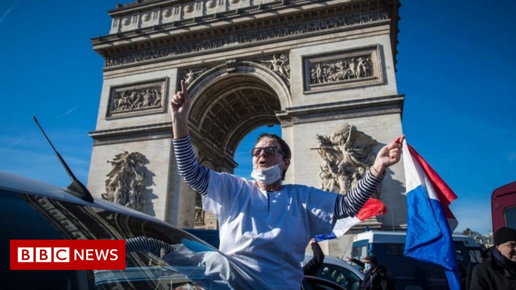 Covid protests: Hundreds fined and dozens arrested as convoy enters Paris