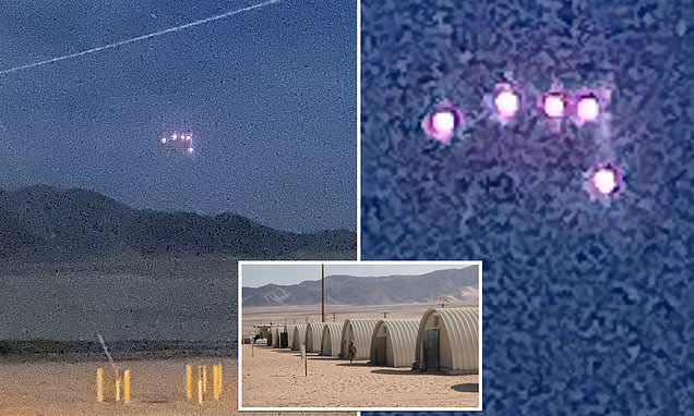 Black 'half-football-field-sized' triangular UFO seen hovering over military base...