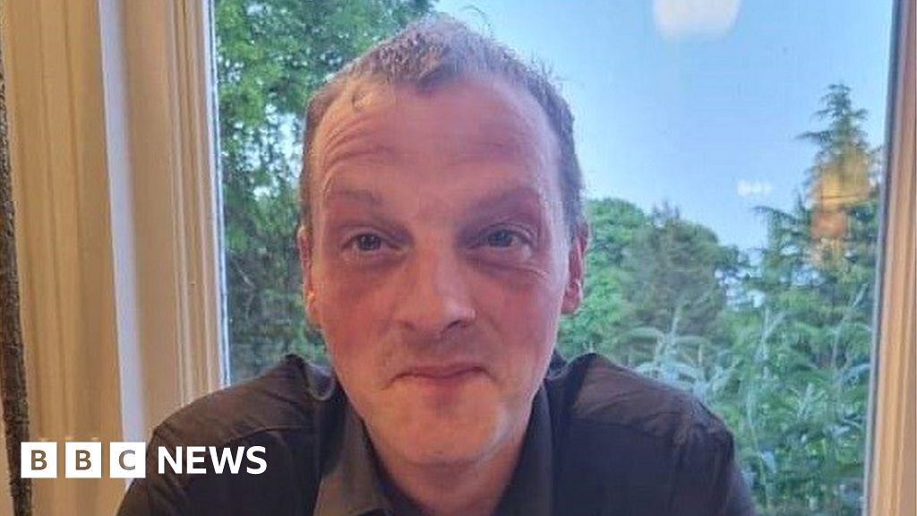 Driver who died in M53 school bus crash named