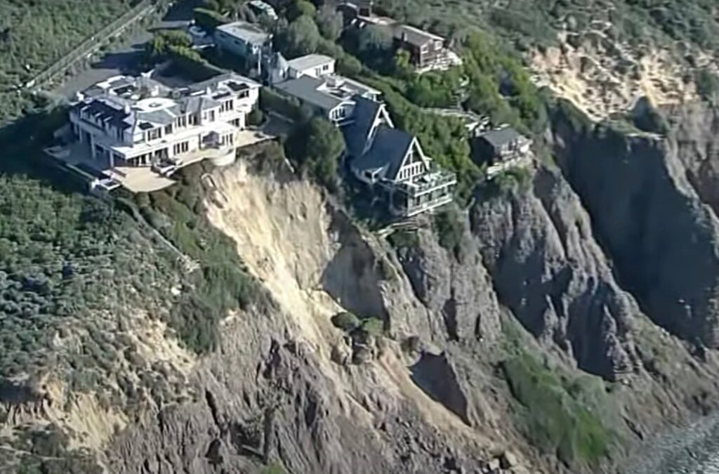 3 multimillion-dollar homes teetering on edge of California cliff after landslide, footage shows