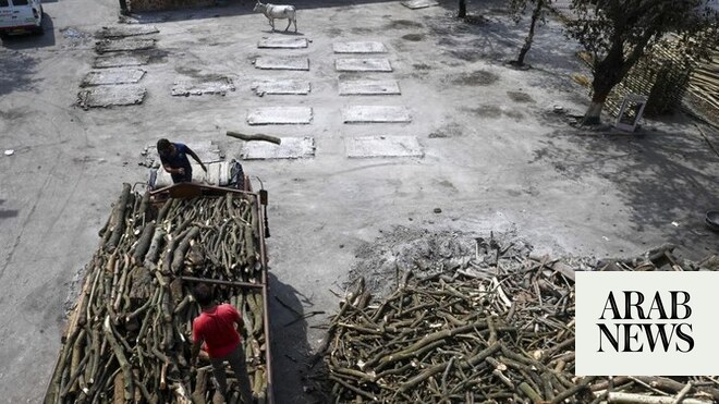 Indian man awakes on funeral pyre...