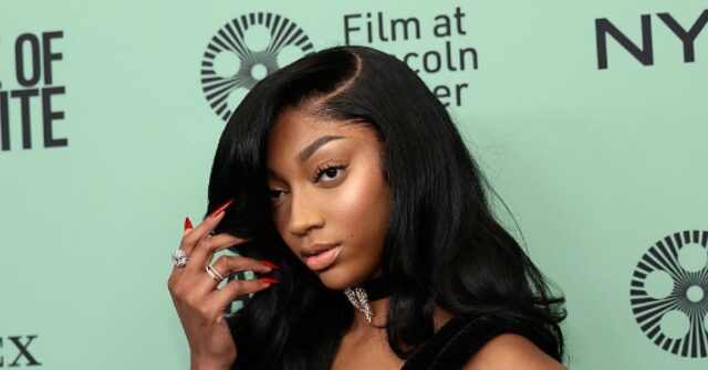 Angel Reese Trades Sneakers for Wings in Victoria's Secret Runway Shoot