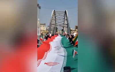 Iranians form human chains across bridges, at power plants