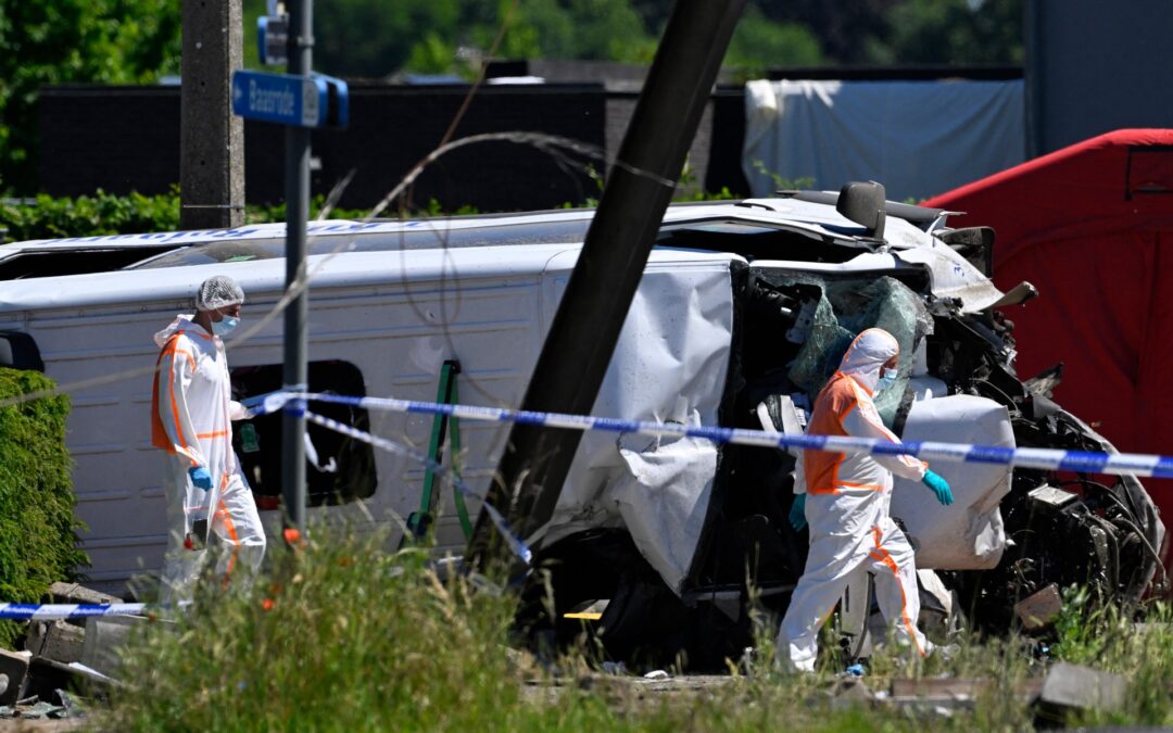 Four people killed after minibus collides with train in Belgium
