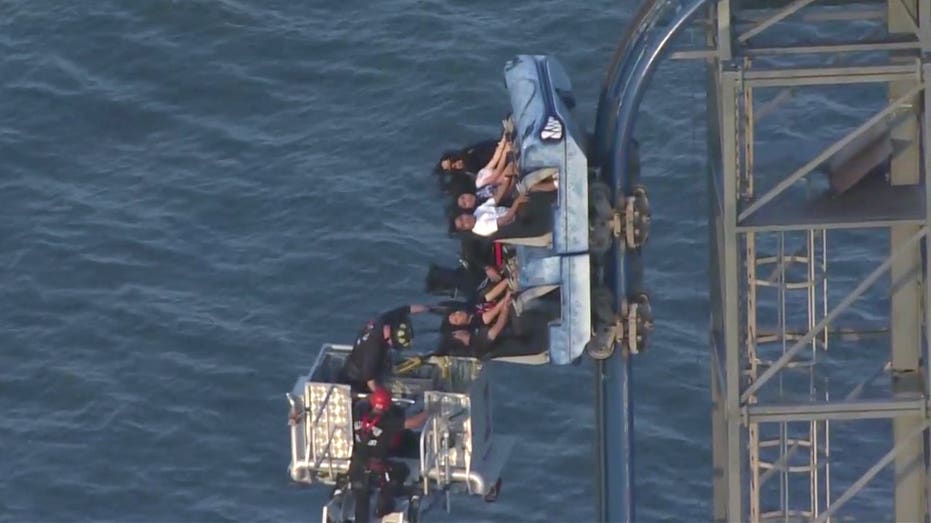 Eight riders left dangling atop 100-foot roller coaster for over three hours at Texas amusement park