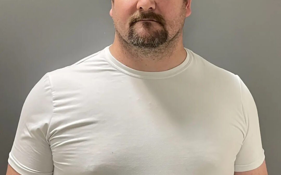School employee accused of secretly filming 12 girls in changing room faces new charges