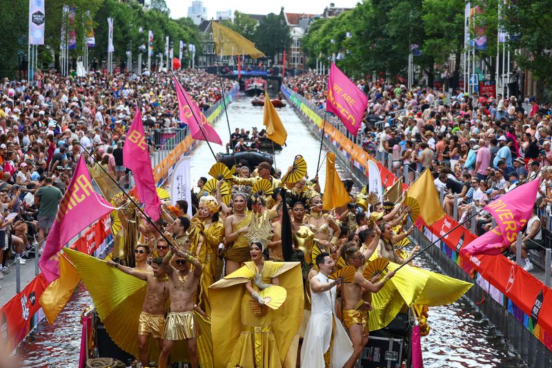 Thousands in Amsterdam for boisterous WorldPride in shadow of Berlin attack...