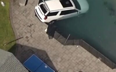 Woman dies after plunging her SUV into Long Island swimming pool